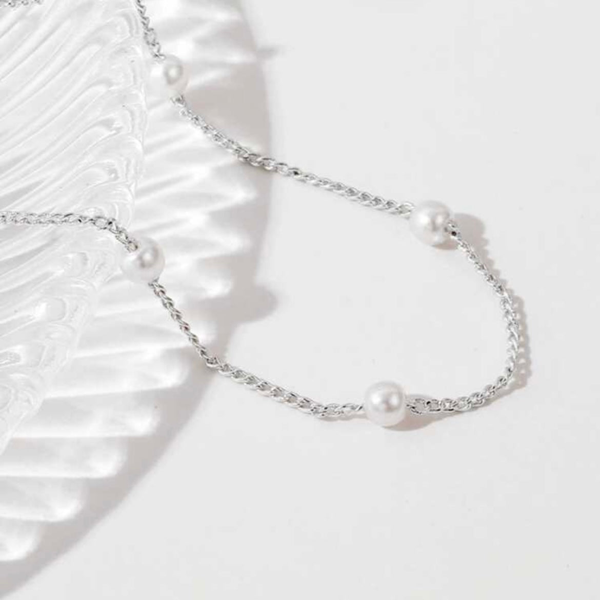 Silver and Pearl Bracelets